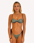 Blue and green Octopus print bikini bottom on model, 5'4" wearing size Small
Front view of ocean print bikini bottom from Somewhere On A Yacht
Octopus blue and green bikini bottom styled on a yacht